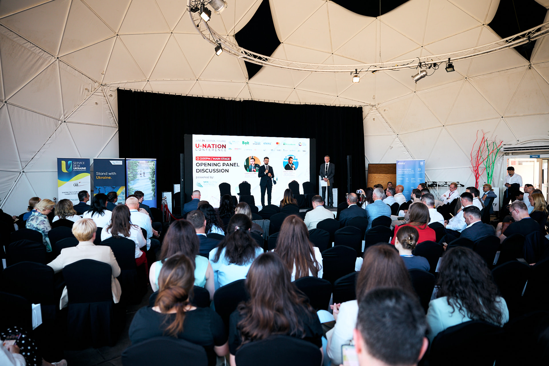 Opening panel discussion in front of a full audience at the U-Nation Conference